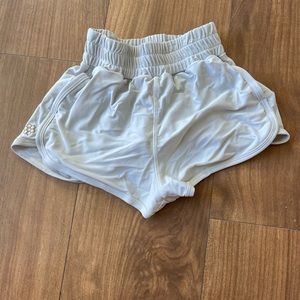 Off white flowy honeycut shorts